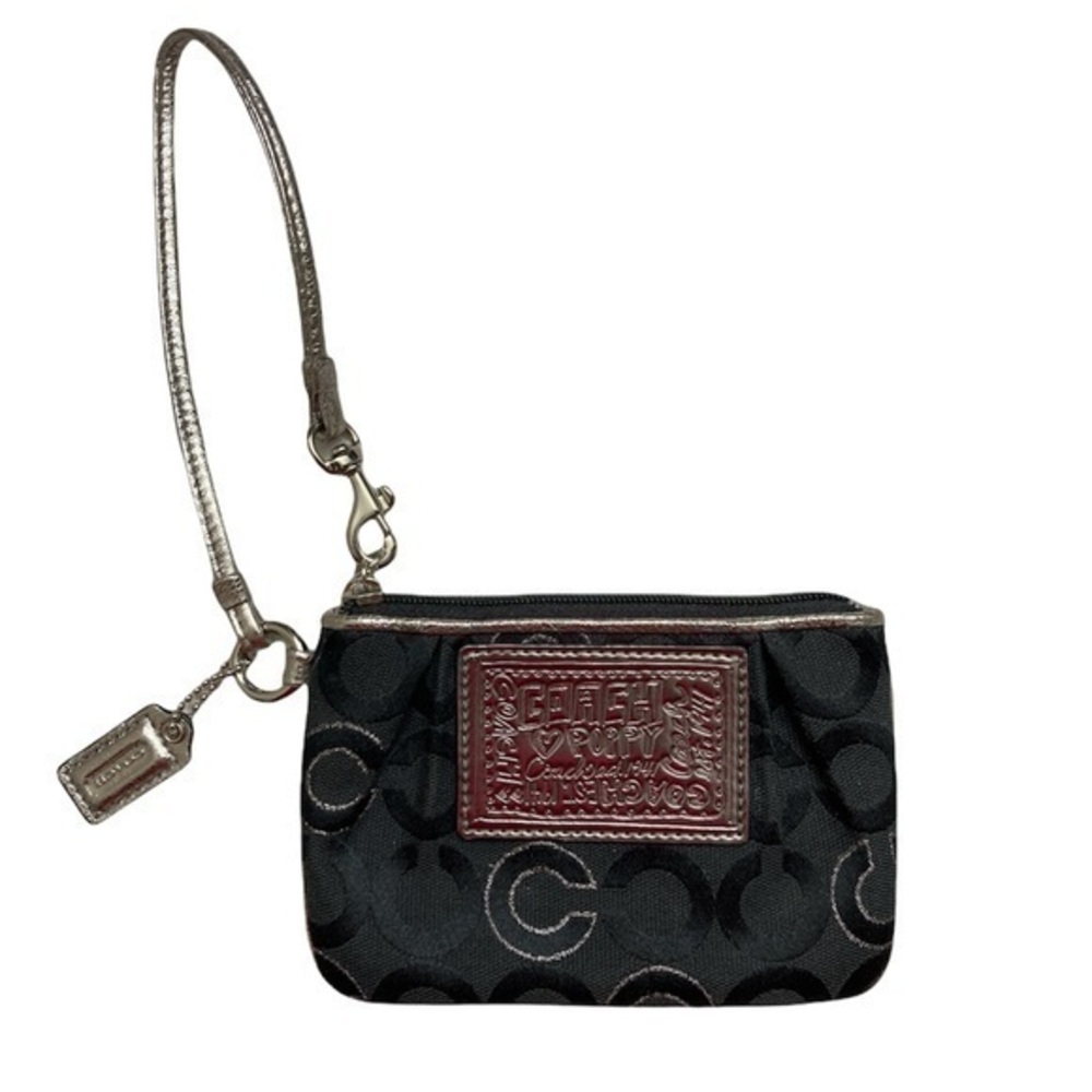 Coach op art c black silver poppy wristlet bag